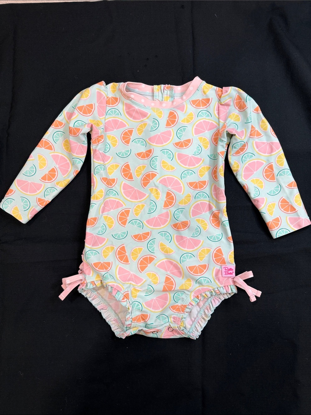 RUFFLE BUTTS “SQUEEZE THE DAY” LONG SLEEVE ONE PIECE UPF50+ SWIMSUIT SIZE 5